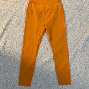 Gymshark leggings, yellow, wore once hung dried. Like new